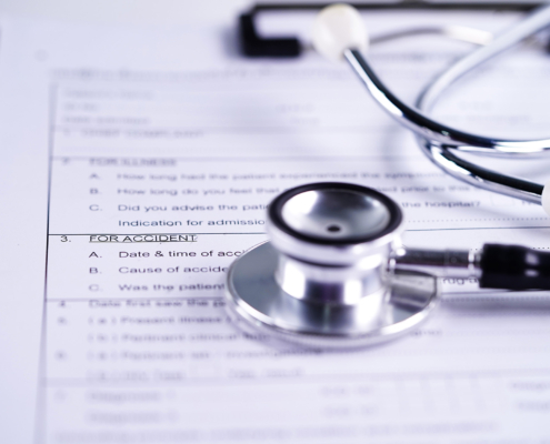 Health Insurance Accident Claim Form With Stethoscope